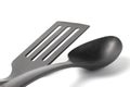 Shovel and spoon for the kitchen, black on a white background, close-up, isolate Royalty Free Stock Photo
