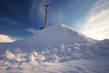 shovel stuck in a large snow pile