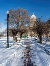 Shoveled sidewalk leading to the Idaho State capital in winter Royalty Free Stock Photo