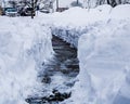 A shoveled sidewalk showing the aftermath of a severe snowstorm in Chardon, Ohio Royalty Free Stock Photo