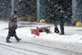 Shoveling snow in blizzard