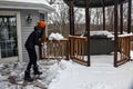 Shoveling Snow off a Deck Royalty Free Stock Photo