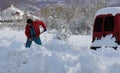 Shoveling snow in winter