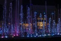 Show of colorful musical fountains in lilac colors at night Sirik, horizontal