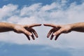 show hand of man with forefinger reach for point and touch against sky - Connection Royalty Free Stock Photo