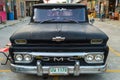 Show old black chevrolet truck at Night market, Srinakarin road, Bangkok, Thailand Royalty Free Stock Photo