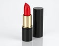 Show red lipstick in 3D on a white background. Show the lipstick in a slightly curveds Royalty Free Stock Photo