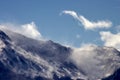 Snow storm brewing in Colorado mountains with a bird soaring above. Royalty Free Stock Photo