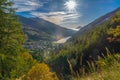 Show in the Varaita Valley: from the summit of Mount Peyron with a view of Lake Pontechianale and the top of Monviso Royalty Free Stock Photo