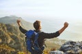 Show yourself what youre made of. a young man cheering while hiking up a mountain.