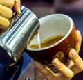 Showcase Barista making Latte art coffee