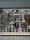 Showcase with branded Nike sneakers in a sports store
