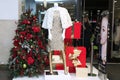 Showcase Christmas shop with mannequins, elegant expensive cloth