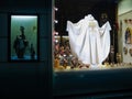 Showcase of a church shop with religious items in Vienna