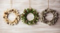 Showcase festive wreaths in a flat lay on a light wooden backdrop