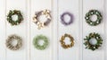 Showcase festive wreaths in a flat lay on a light wooden backdrop