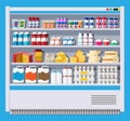 Showcase fridge with dairy products. Royalty Free Stock Photo