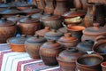 Showcase of Handmade Ukraine Ceramic Pottery in a Roadside Market with Ceramic Pots and Clay Plates Outdoors.