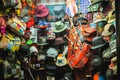 Showcase of a hat and vintage bag shop in Milan