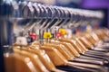 Showcase with men's trousers on hangers in a men's store. Royalty Free Stock Photo