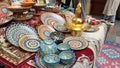 The showcase presents an assortment of colorful hand-painted ceramic tableware Royalty Free Stock Photo