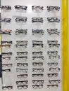 Showcase in a shop with rows of various optical glasses for sale
