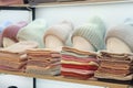 Showcase of trade tent with variety of women\'s hats knitted hats, scarves, hats Royalty Free Stock Photo