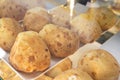 Showcase of a traditional Brazilian cafe that sells Minas Gerais cheese bread