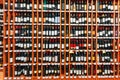 Showcase With Wine Bottles At The Wine Store. Wall With Alcoholic Drinks Wine Bottles On Shelves Royalty Free Stock Photo