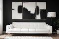 Black and white abstract painting on empty wall of cozy living room interior Royalty Free Stock Photo
