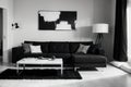 Black and white abstract painting on empty wall of cozy living room interior Royalty Free Stock Photo