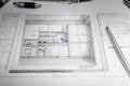 Computer Tablet Showing Kitchen Illustration Sitting On House Plans With Pencil and Compass. Royalty Free Stock Photo