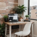 Creative workspace of a blogger. Laptop computer on wooden table in loft style corner office with brick walls and big windows. Des