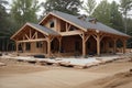 New home construction. build with wooden truss, post and beam framework. Royalty Free Stock Photo