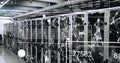 Showcasing row of server racks operating in data center, with blinking lights and digital overlay Royalty Free Stock Photo