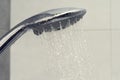 Shower in bathroom with water drops flowing Royalty Free Stock Photo