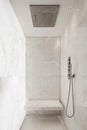 Shower covered in white marble, design