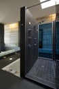 Shower with dark grey ceramic walls