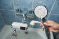 Shower with electric water heater in the bathroom Royalty Free Stock Photo