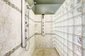 Shower with glass block wall and tile trim Royalty Free Stock Photo