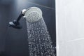 Shower head in bathroom with water drops Royalty Free Stock Photo