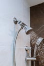 shower head in bathroom with water drops flowing Royalty Free Stock Photo