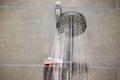 Shower head with flow of water spilling out Royalty Free Stock Photo