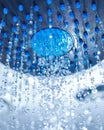 Shower with flowing drops and streams of water Royalty Free Stock Photo