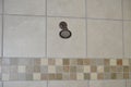 Shower Head in Marble and Granite Tiled Shower Royalty Free Stock Photo