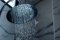 [shower head] shower head in bathroom with water drops flowing Royalty Free Stock Photo