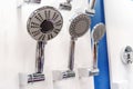 Shower heads in a plumbing store. Trade in bathroom accessories Royalty Free Stock Photo