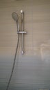 Shower and shower holder. modern chrome shower attachment with thermostatic controller