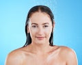 Shower portrait, water and woman in a studio with a smile from cleaning and skincare. Wellness, bathroom and beauty