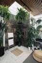 Shower in tropical bathroom with green plants